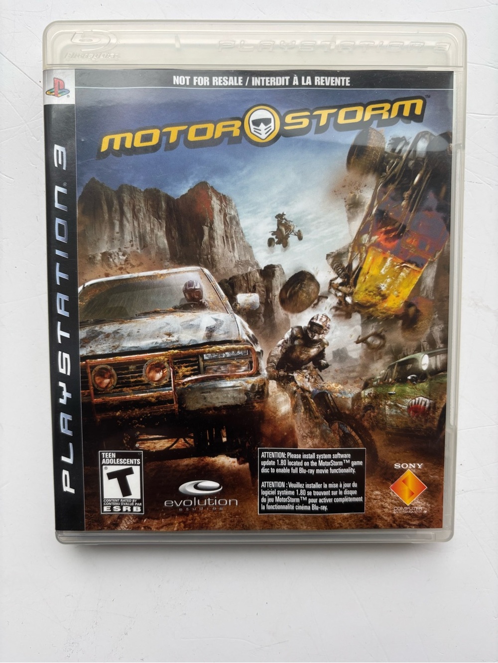 Sony MotorStorm PlayStation 3 Racing Game — White Case with Yellow Logo